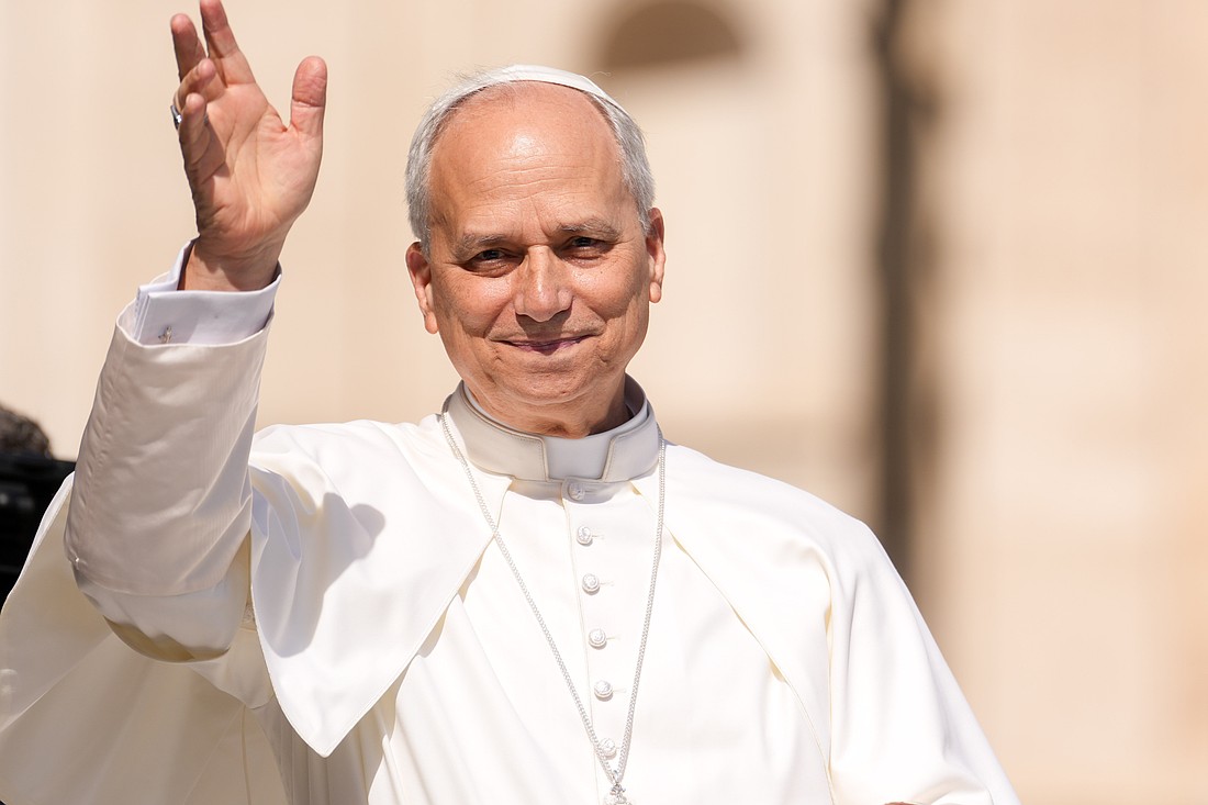 Pope Leo XIV greets visitors and pilgrims from the popemobile as he rides around St. Peter's Square at the Vatican before his weekly general audience June 4, 2025. (CNS photo/Lola Gomez)