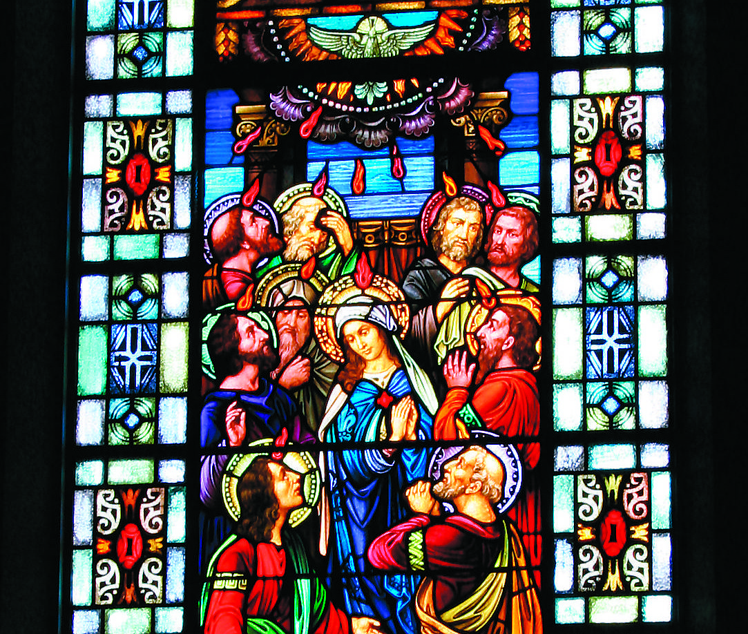 The Pentecost window, found in Our Lady of Perpetual Help Church, Maple Shade, depicts the descent of the Holy Spirit upon the apostles. Pentecost Sunday 2025 will be celebrated June 8. Monitor file photo