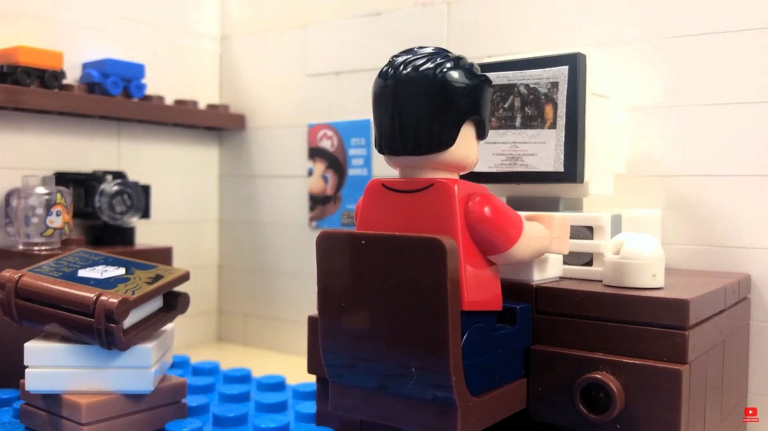 Blessed Carlo Acutis sits in front of a computer in a scene from a stop-motion animation Lego-Carlo Acutis film made by three brothers in County Limerick, Ireland, and released in mind-May 2025 on their YouTube channel, Fiontar Floinn. On the wall to left is a blue poster of the last Super Mario Bros video game to be released in the lifetime of Blessed Carlo (1996-2006). (OSV News photo/courtesy Flynn family) Editors: best quality available.