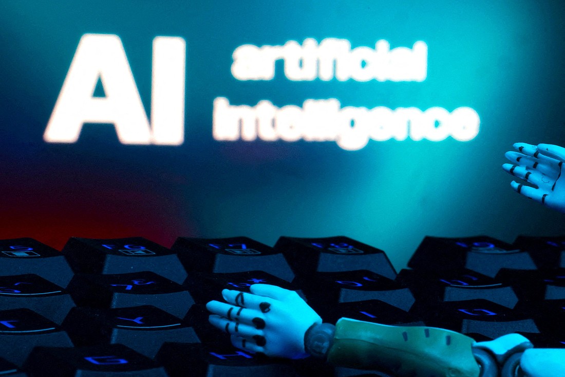 A message reading "AI artificial intelligence," a keyboard and robot hands are seen in this illustration created on Jan. 27, 2025. The U.S. bishops in a letter to congressional leadership say that artificial intelligence must serve all of humanity. (OSV News photo/Dado Ruvic, Reuters)