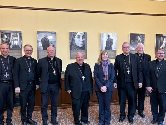 Minnesota State Rep. Melissa Hortman, to right of Archbishop Bernard Hebda of St. Paul and Minneapolis, and other bishops of Minnesota on March 27, 2025, the bishops' annual advocacy day. The state representative and her husband were shot and killed early morning June 14 in what appears to be a targeted attack against state lawmakers. (OSV News photo/courtesy of Minnesota Catholic Conference) EDITORS: best quality available