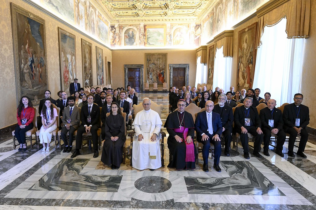 Pope Leo XIV poses for a photo with students taking part in a summer school hosted by the Vatican Observatory during an audience at the Vatican June 16, 2025. (CNS photo/Vatican Media)