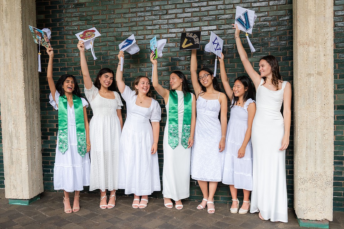 Graduates wave their mortarboards in the air letting everyone know they are now among the Stuart alumni. Photo courtesy of Stuart Country Day School
