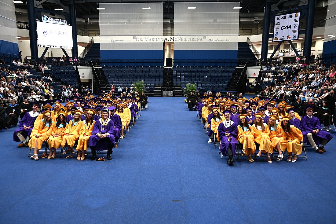 Michael Scotto, St. Rose High School photographer and guest speaker at this year’s Commencement ceremony, snapped one last photo of the class together from his place at the podium May 29.