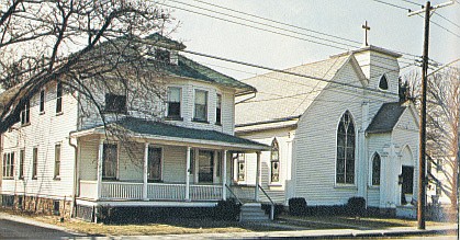This photo, taken from a book on the history of St. Anthony of Padua Parish, shows the original St. Anthony of Padua rectory, left, and church building.