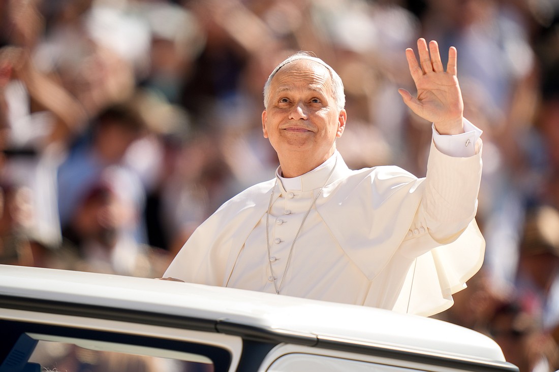 Pope Leo XIV greets visitors and pilgrims from the popemobile as he rides around St. Peter's Square at the Vatican before his weekly general audience June 25, 2025. (CNS photo/Lola Gomez)