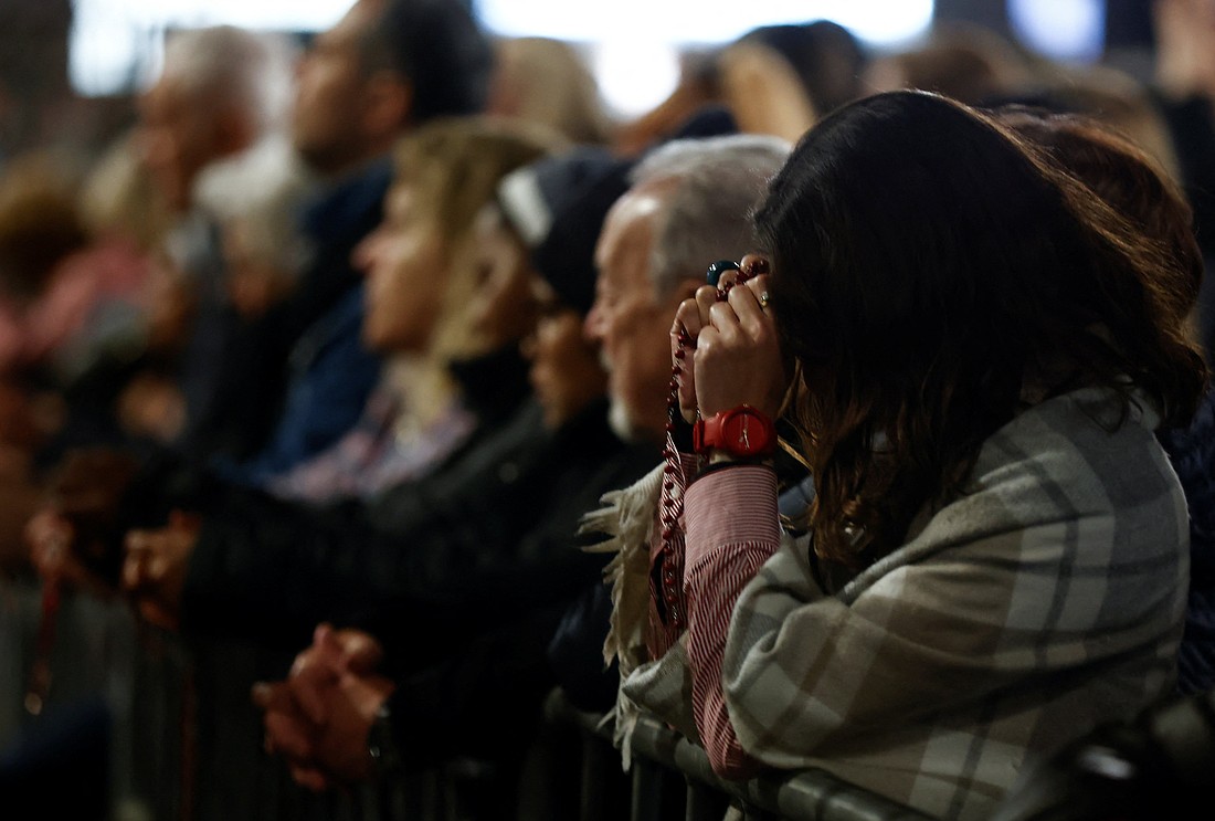 People attend a prayer service at the Papal Basilica of Saint Mary Major (Santa Maria Maggiore), after the funeral of Pope Francis, in Rome, Italy, April 26, 2025. (OSV News photo/Vincenzo Livieri, Reuters)