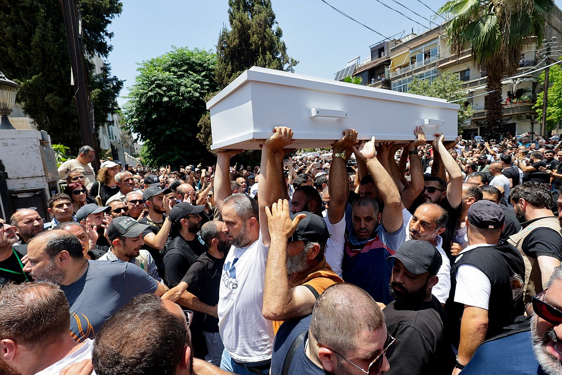 People carry a casket during the funeral of victims of a suicide bombing at the Mar Elias Church on Sunday, in Damascus, Syria, June 24, 2025. (OSV News photo/Khalil Ashawi, Reuters)