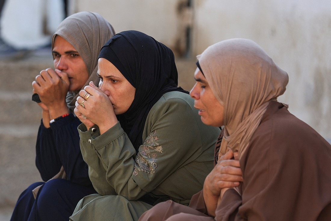 Mourners react during the funeral June 25, 2025, of Palestinians who, according to Gaza’s health ministry, were killed in an Israeli air strike on a house in Gaza City. (OSV News photo/Dawoud Abu Alkas, Reuters).