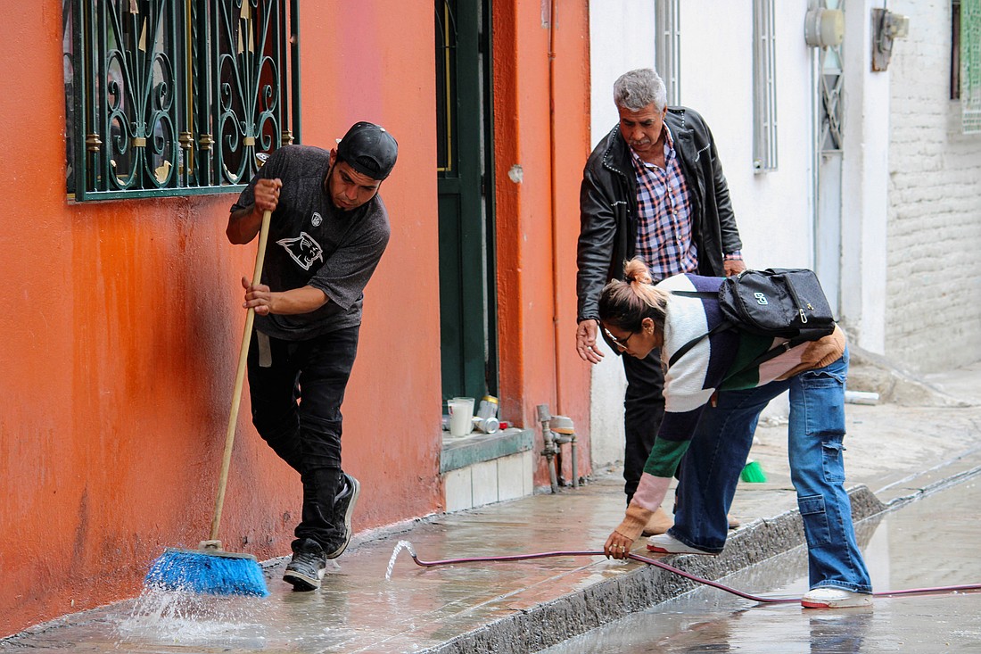 Residents wash blood stains outside a house in Irapuato, Guanajuato state, Mexico, June 25, 2025, after gunmen opened fire June 22, during a party celebrating the Nativity of John the Baptist, leaving several casualties. Father Héctor Alejandro Pérez was attacked and seriously wounded June 30, after leaving his residence at the St. Francis of Assisi parish in the southeastern city of Villahermosa, according to a statement the same day from the Diocese of Tabasco. (OSV News photo/Juan Moreno, Reuters)