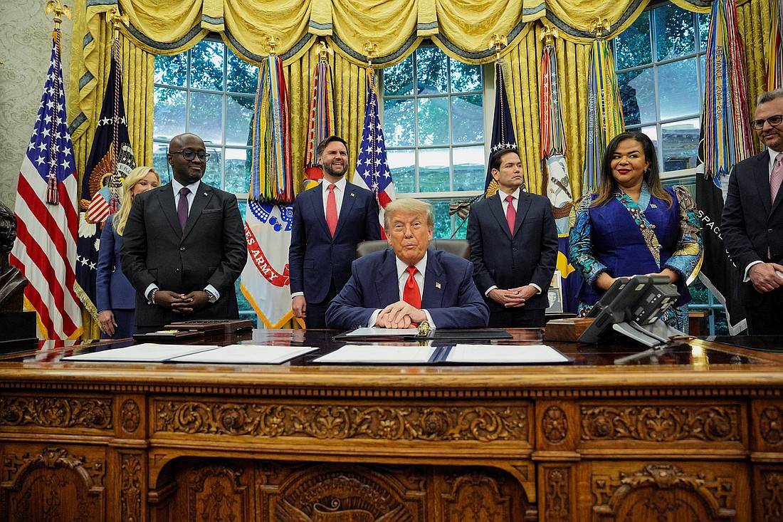 U.S. President Donald Trump, Secretary of State Marco Rubio and Vice President JD Vance pose with Rwanda's Foreign Minister Olivier Nduhungirehe, far left, and Democratic Republic of the Congo's Foreign Minister Therese Kayikwamba Wagner, far right, during the signing of a peace agreement in the Oval Office at the White House in Washington June 27, 2025. (OSV News photo/Ken Cedeno, Reuters)..