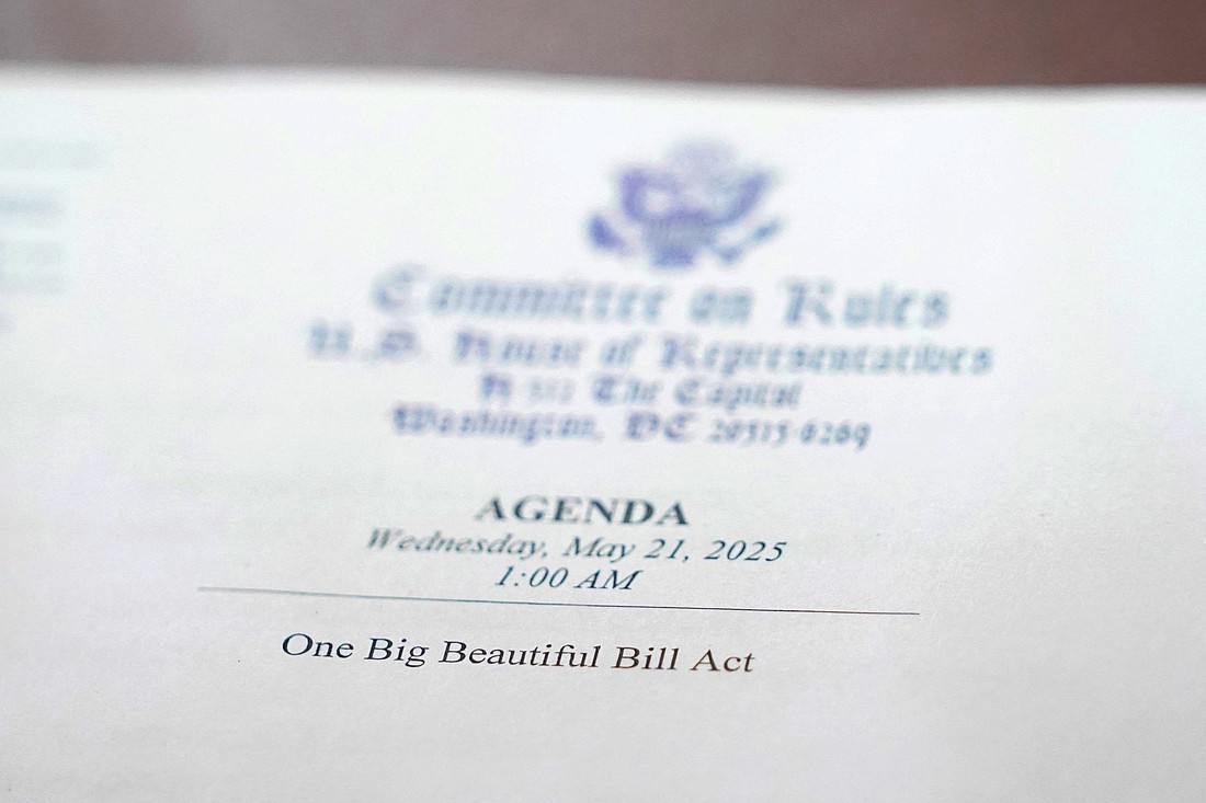 An agenda with the words "One Big Beautiful Bill Act" is seen May 21, 2025, the day of a House Rules Committee hearing in Washington on U.S. President Donald Trump's plan for extensive tax cuts. On July 3, the House passed the measure in a 218-214 vote, sending it to Trump’s desk for his signature July 4. The Senate approved the reconciliation package July 1. (OSV News photo/Nathan Howard, Reuters)