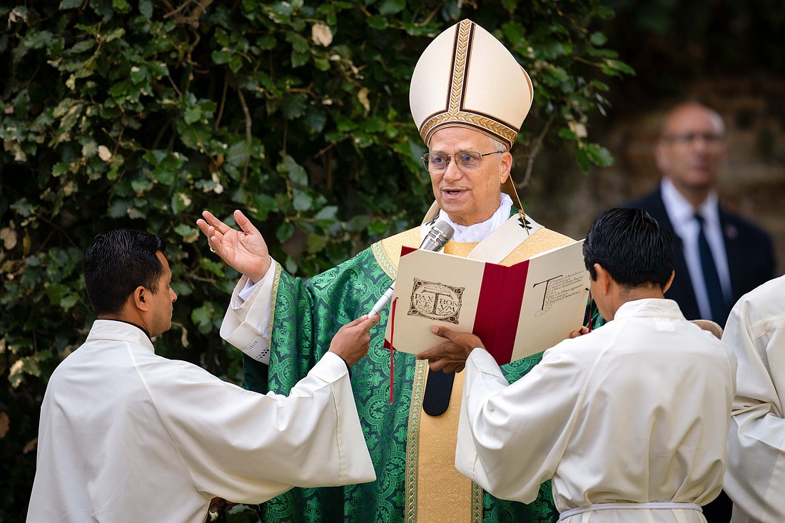 Pope Leo XIV gives his blessing while celebrating Mass for the Care of Creation on the grounds of the Borgo Laudato Si' ecology center in Castel Gandolfo, Italy, July 9, 2025. (CNS photo/Cristian Gennari, pool)