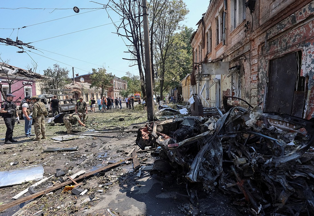 Police experts work at the site of the Russian drone strike in Kharkiv, Ukraine, July 7, 2025, amid Russia's attack on Ukraine. (OSV News photo//Vyacheslav Madiyevskyy, Reuters)