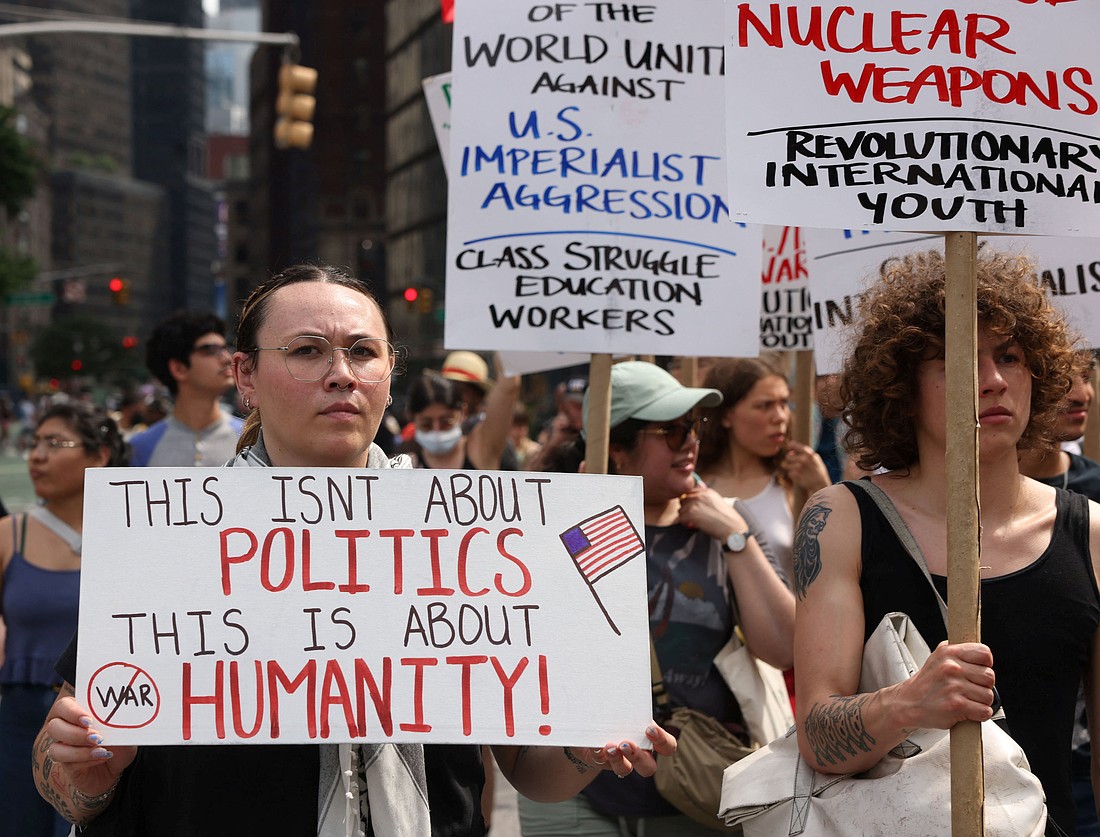 Demonstrators march following U.S attack on Iran's nuclear sites and against Iran-Israel conflict, at Times Square in New York City, U.S. June 22, 2025. (OSV News photo/Caitlin Ochs, Reuters)