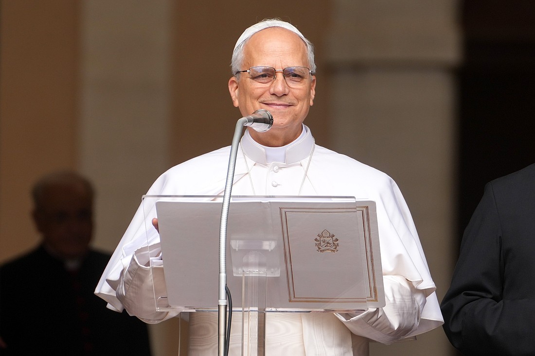 Pope Leo XIV smiles at the conclusion of his first Angelus prayer in Castel Gandolfo, Italy, July 13, 2025. (CNS photo/Lola Gomez)