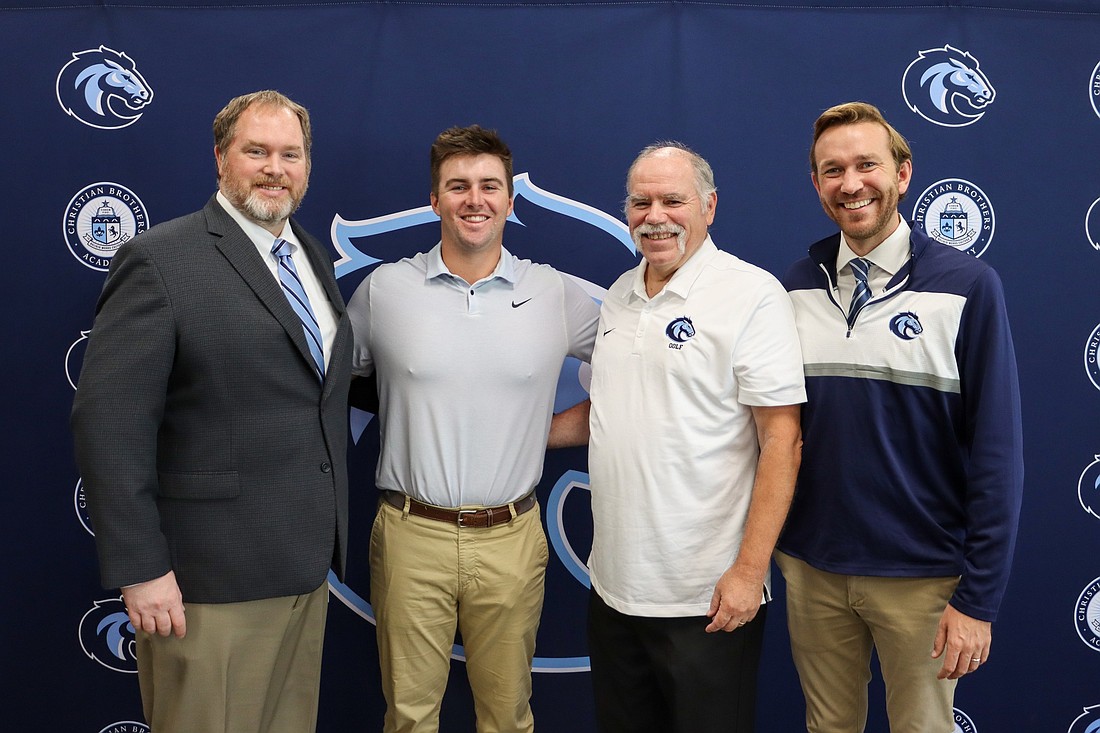 From left, Christian Brothers Academy principal Neil Begley, PGA Tour golfer and CBA alumnus Chris Gotterup, former CBA golf coach and retired teacher Tim Sewnig, and former athletic director Mike Mazzaccaro pose for a photo during Gotterup’s visit to his alma mater in 2023. A 2017 graduate, Gotterup returned to speak with the school’s golf team just weeks after earning his PGA Tour card. He is scheduled to compete in The Open Championship this weekend. Photo credit: CBA Facebook page