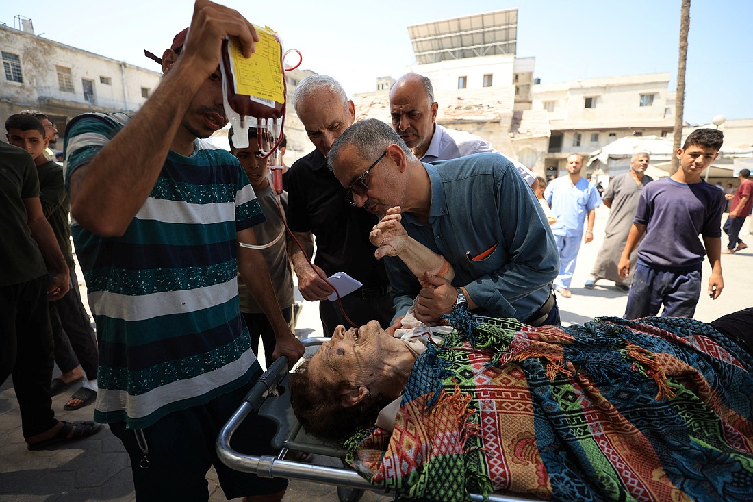 A wounded Palestinian Christian woman is brought into at Al-Ahli Arab Baptist Hospital following what initial reports and medics say was an Israeli tank attack on the church on the Holy Family Parish -- the only Catholic parish in the Gaza Strip, in Gaza City July 17, 2025. (OSV News/Dawoud Abu Alkas, Reuters)