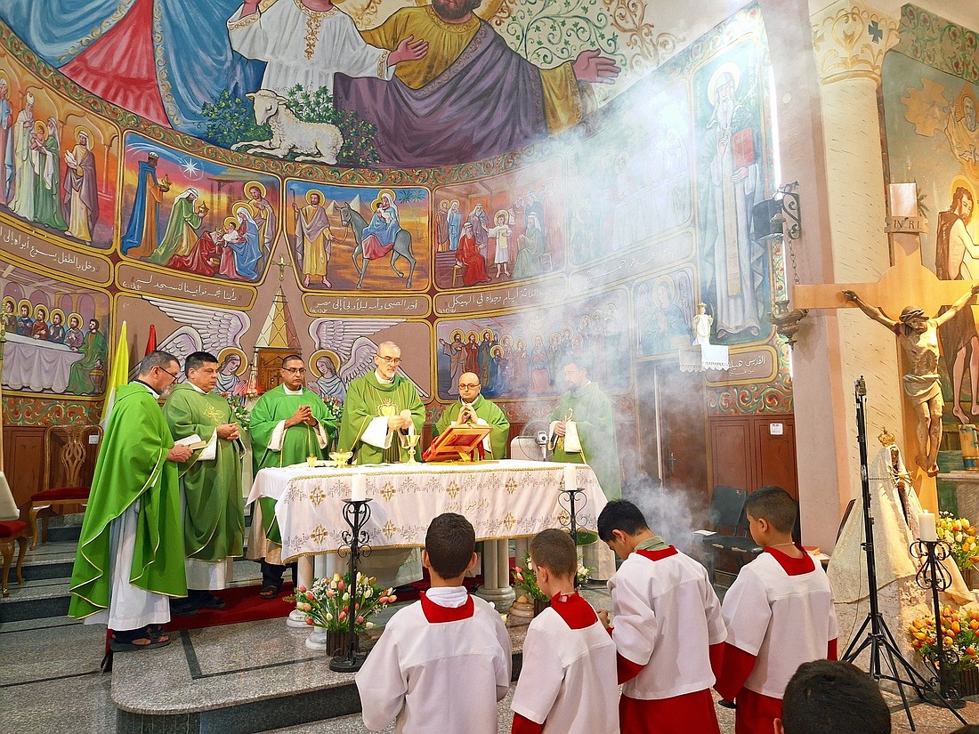 Latin Patriarch of Jerusalem Cardinal Pierbattista Pizzaballa entered the Gaza Strip July 18, 2025, together with Greek Orthodox Patriarch of Jerusalem Theophilos III, offering his support, closeness and prayers following the July 17 Israeli army attack on the parish. Cardinal Pizzaballa remained in Gaza City until July 20, and is seen offering Sunday morning Mass in the parish church, July 20, accompanied by Father Gabriel Romanelli, the parish priest who was injured during the attack. (OSV News/courtesy Holy Family Parish)
