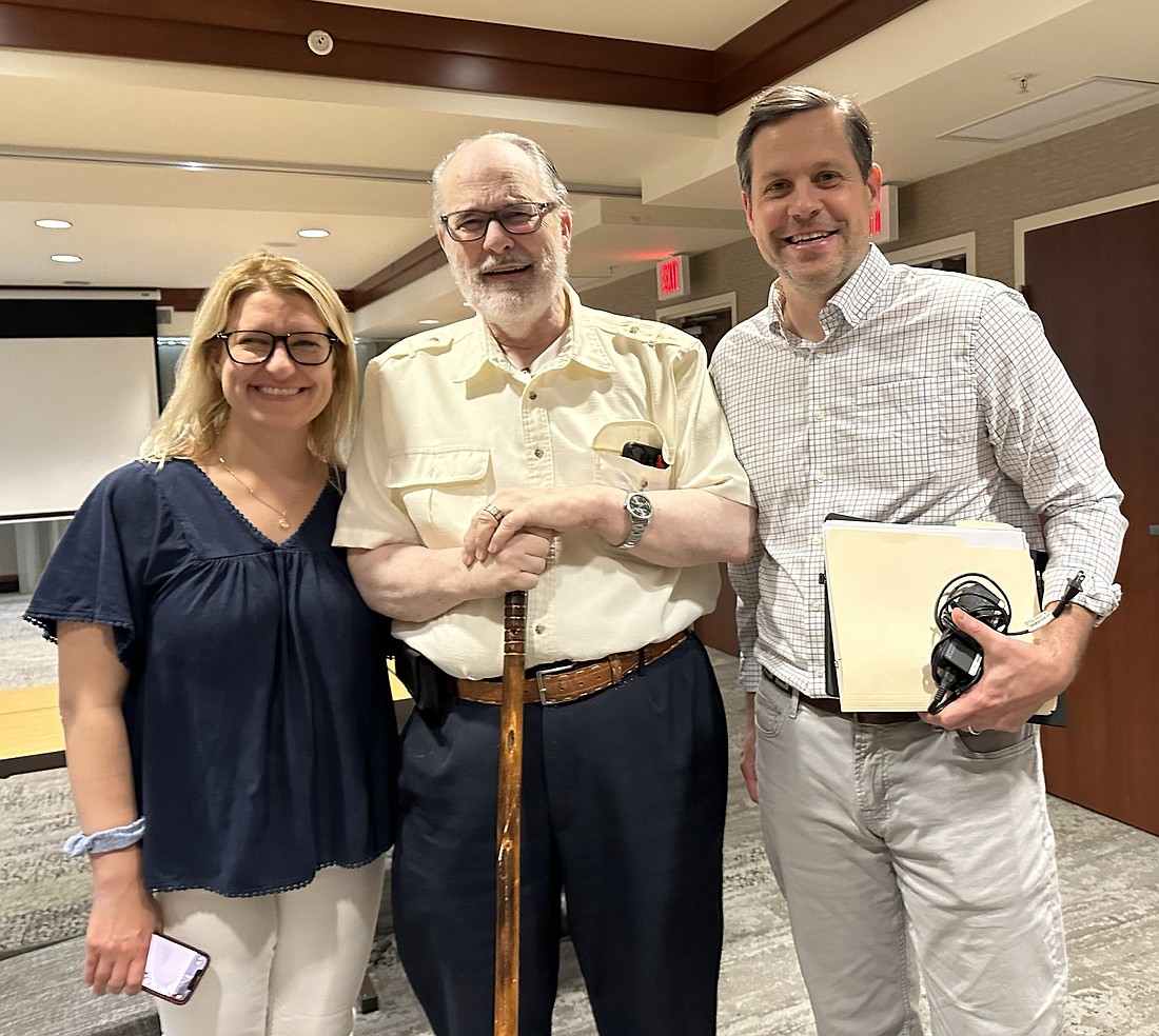 Dr. Thomas Hilgers (center), co-creator of the Creighton Model FertilityCare System, poses with his two OB-GYN children, Dr. Teresa Hilgers and Dr. Steve Hilgers, at a meeting of the St. John Paul the Great Society of Procreative Surgeons last summer. (OSV News photo/Zoey Maraist)