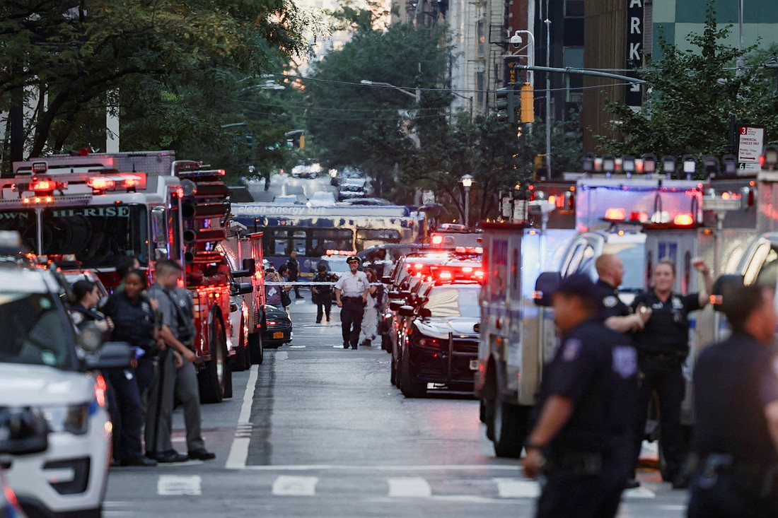 Police officers gather during a reported active shooter situation in the Manhattan borough of New York City July 28, 2025. The shooting at a midtown Manhattan office building left multiple people dead, including an off-duty New York City police officer, sources told the The Associated Press. (OSV News Photo/Bing Guan, Reuters)