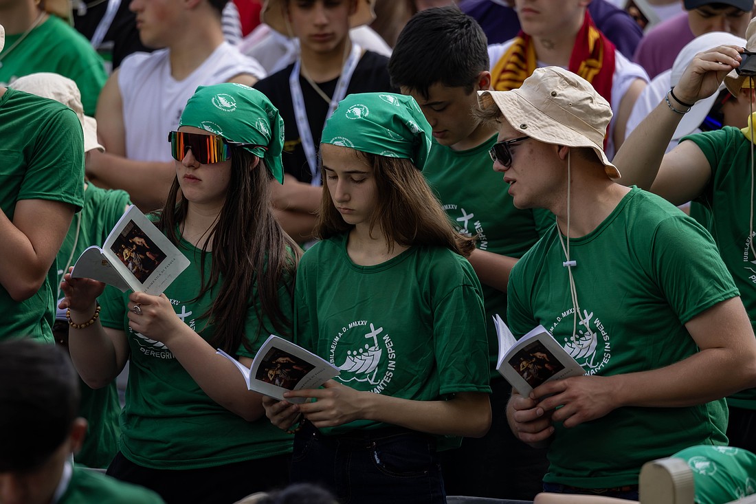 Young people participate in Mass on the second day of the "novendiali" -- nine days of mourning for Pope Francis marked by Masses -- in St. Peter's Square April 27, 2025. The Mass coincided with the Jubilee of Teenagers at the Vatican. (CNS photo/Pablo Esparza).