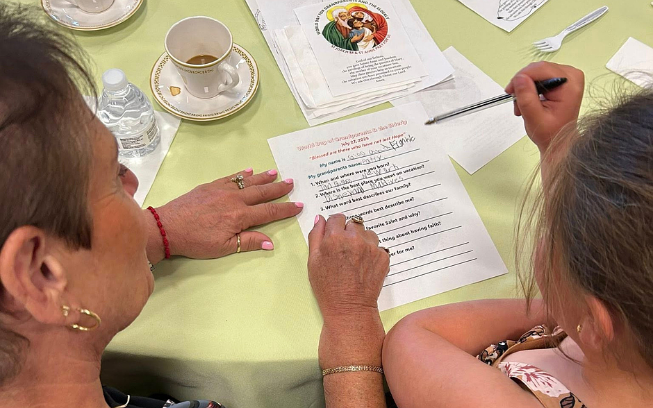 Grandparents and grandchildren spend quality time getting to know each other better by filling out fun questionnaires after Mass at St. Mary Parish, Colts Neck, July 27, in celebration of the World Day of Prayer for Grandparents and the Elderly. Facebook photo