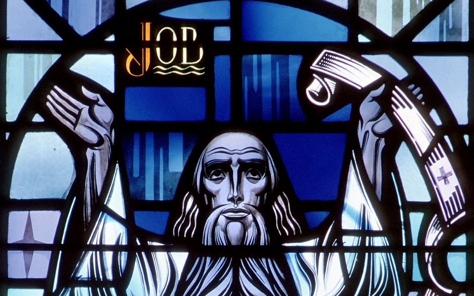 A stained-glass window depicts Job at Sacred Heart Church in Dubuque, Iowa. (OSV News file photo/Crosiers)