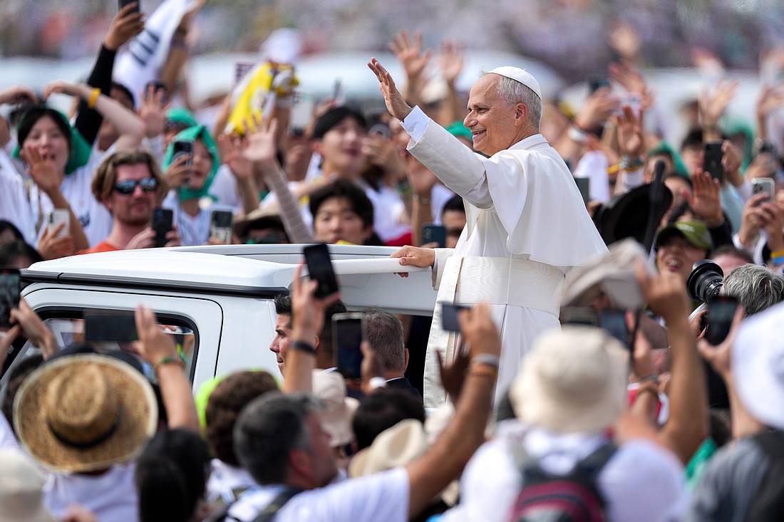 Pope Leo XIV waves to the crowd from the popemobile as he departs after celebrating Mass, concluding the Jubilee of Youth in Rome’s Tor Vergata neighborhood Aug. 3, 2025. (CNS photo/Lola Gomez)