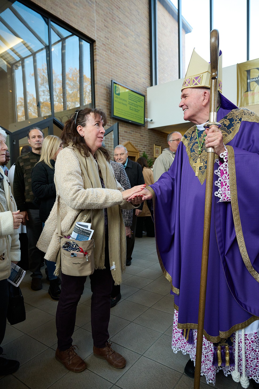Bishop O’Connell greets parishioners following a Mass he celebrated for the First Sunday of Advent on Dec. 1, 2024, in St. Joseph Church. Toms River. Mike Ehrmann photo