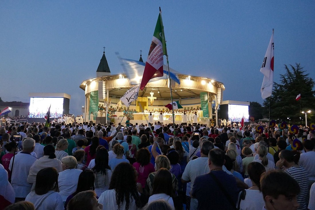 Young people and others gather for prayer behind the Church of St. James in Medjugorje, Bosnia-Herzegovina, in this file photo from the 2024 international youth festival known as Mladifest. Pope Leo XIV sent a message to this year's festival, which is being held Aug. 4-8, 2025. (CNS photo/Courtesy Mladifest)