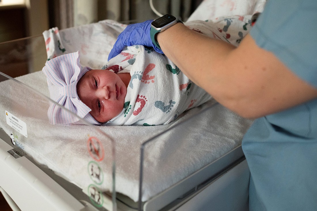 A nurse checks the vitals of a newborn baby in the Family Birth Center at Beaumont Hospital in Royal Oak, Mich., Feb. 1, 2022. United States' total fertility rate fell to a record low in 2024, dipping below 1.6 children per woman, according to new federal data released July 24, 2025, by the Centers for Disease Control and Prevention. (OSV News photo/Emily Elconin, Reuters)