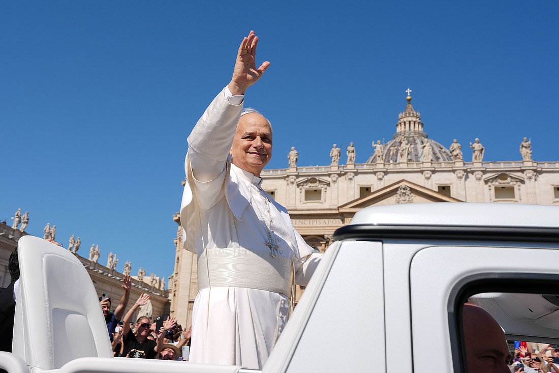 Pope Leo XIV greets people as he rides in the popemobile before celebrating Mass in St. Peter’s Square at the Vatican June 1, 2025, as part of the Jubilee of Families, Children, Grandparents and the Elderly. (CNS photo/Lola Gomez)