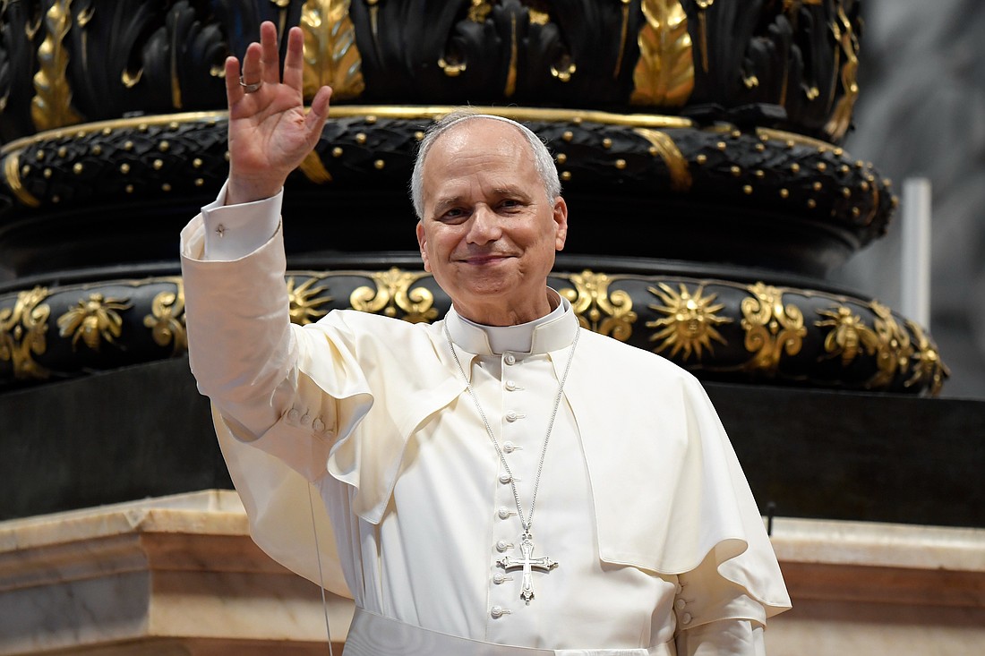 Pope Leo XIV greets pilgrims gathered inside St. Peter's Basilica at the Vatican Aug. 13, 2025, after his weekly general audience. The Catholic University of America in Washington announced Aug. 11 that in October its publishing division will release in print and Kindle editions Pope Leo's dissertation, which he defended in 1987 for his doctoral degree in canon law. (CNS photo/Vatican Media)