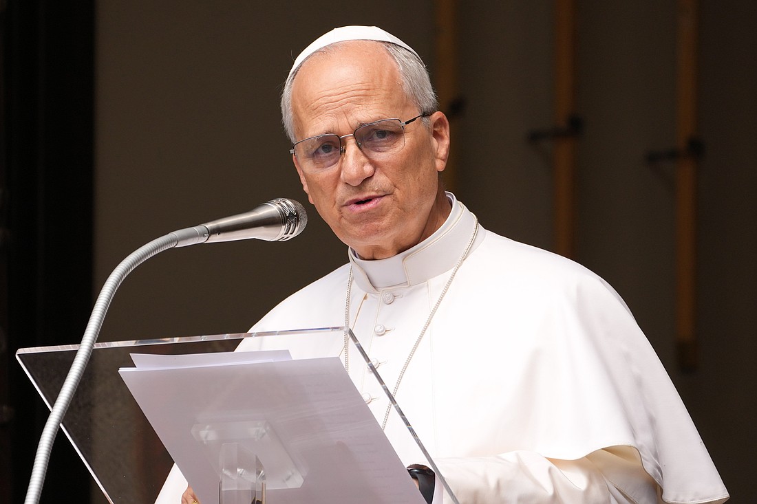 Pope Leo XIV recites the Angelus prayer in Castel Gandolfo, Italy, on the feast of the Assumption of Mary Aug. 15, 2025. (CNS photo/Lola Gomez)