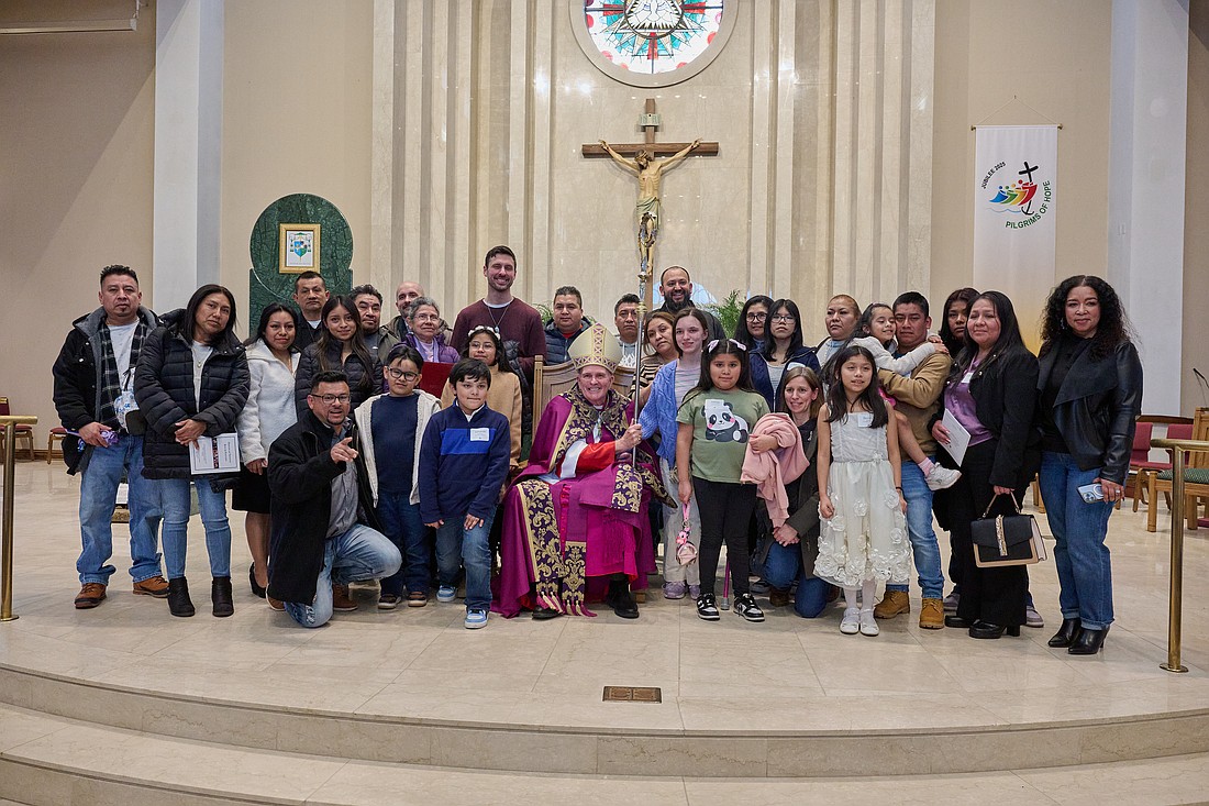 A group of elect, along with their sponsors and family members gather for a photo with Bishop David M. O'Connell, C.M., following the 2025 Rite of Election ceremony held in St. Robert Bellarmine Co-Cathedral, Freehold. In his Scripture reflection for Aug. 17, 2025, Father Garry Koch speaks of the recent increase in Mass attendance and people seeking to receive their Sacraments in spite of challenging times facing the Church. Mike Ehrmann photo