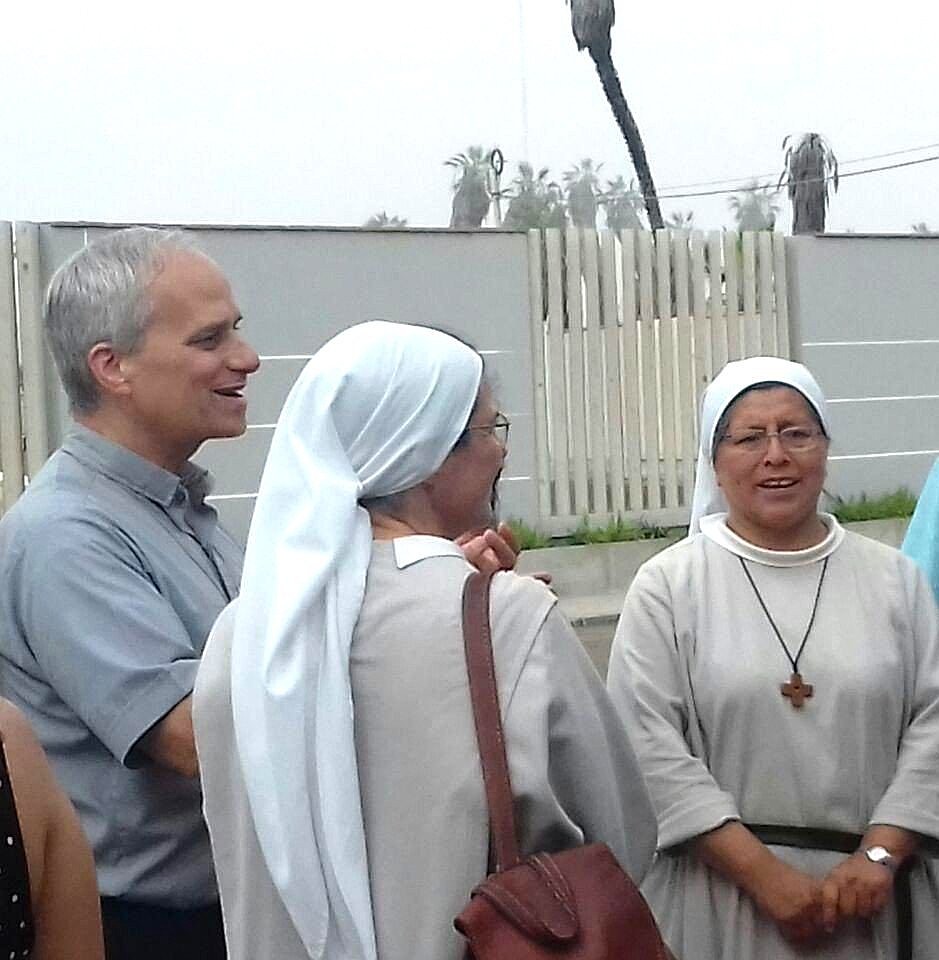 The future Pope Leo XIV visits with Augustinian sisters in Peru in this undated photo. As an Augustinian priest, then-Father Robert F. Prevost spent many years as a missionary in Peru and also served as bishop of that country's Diocese of Chiclayo. A Chicago native, he was elected pope May 8, 2025, at the Vatican, becoming the first U.S.-born pope in history. (OSV News photo/courtesy Augustinian Sister Carmen Toledano)