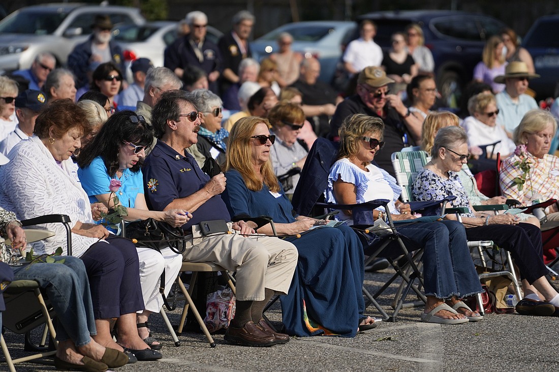 Parishioners and members of other area parishes participate in a "Keep Our Priests" rosary rally at St. Mary Church in East Islip, N.Y., April 29, 2024. More than 300 people gathered to pray for changes in U.S. immigration procedures to prioritize visa and green card applications for foreign-born religious workers, many of whom are being forced to leave the country because of federal delays in processing immigration paperwork. (OSV News photo/Gregory A. Shemitz)