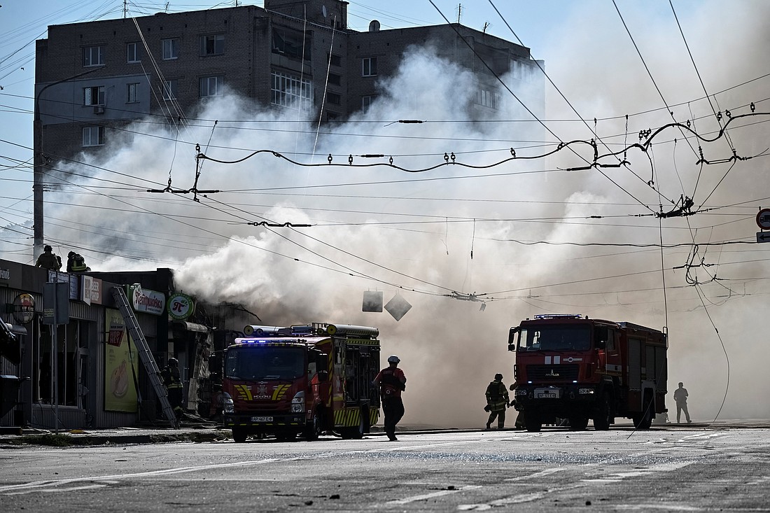Firefighters work at the site of a Russian missile strike in Zaporizhzhia, Ukraine, Aug. 18, 2025. (OSV News photo/Reuters)