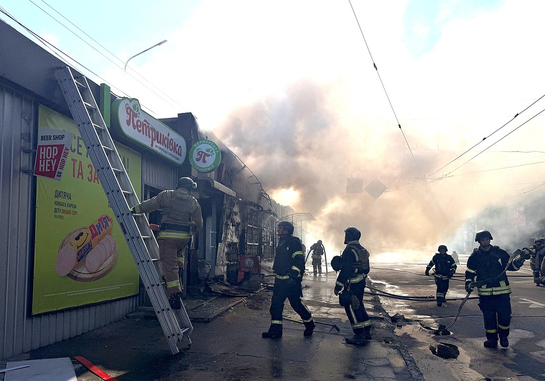 Firefighters work at the site of a Russian missile strike in Zaporizhzhia, Ukraine, Aug. 18, 2025. (OSV News photo/Reuters)