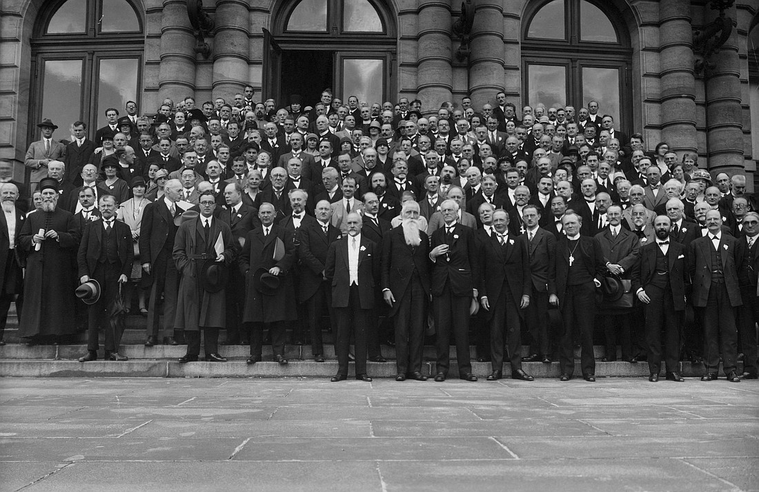 Anglican, Protestant and Orthodox Church leaders pose for a photo during the Universal Christian Conference on Life and Work in Stockholm in August 1925. The World Council of Churches published the photo in conjunction with an ecumenical celebration in Stockholm of the conference's 100th anniversary. (CNS photo/World Council of Churches)