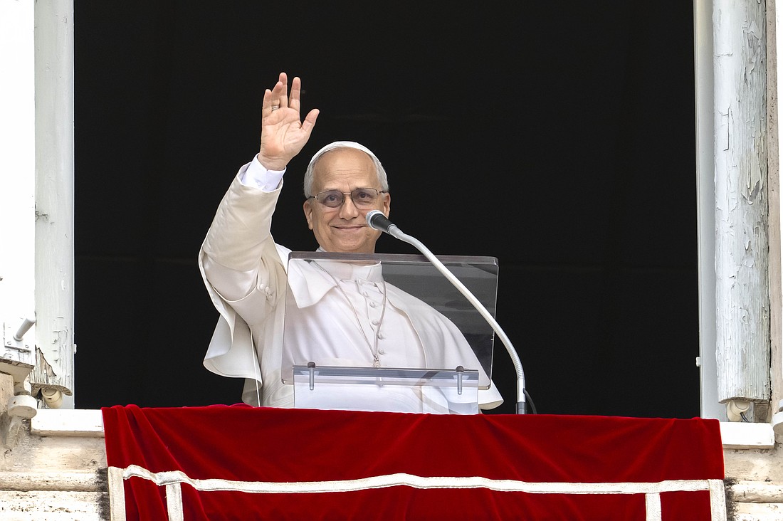 Pope Leo XIV waves after leading the recitation of the Angelus prayer with visitors gathered in St. Peter's Square at the Vatican Aug. 24, 2025. After the Angelus, Pope Leo asked people to pray for peace in Ukraine as the country marked its Independence Day. (CNS photo/Vatican Media)
