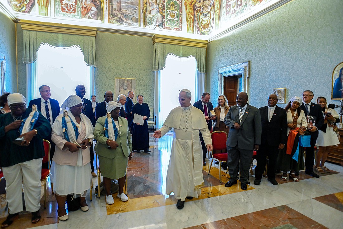 Pope Leo XIV meets at the Vatican Aug. 23, 2025, with refugees and their descendants who were exiled from the Chagos Islands to clear the way for the establishment of a major U.S. and U.K. military base on Diego Garcia, the largest island. (CNS photo/Vatican Media)