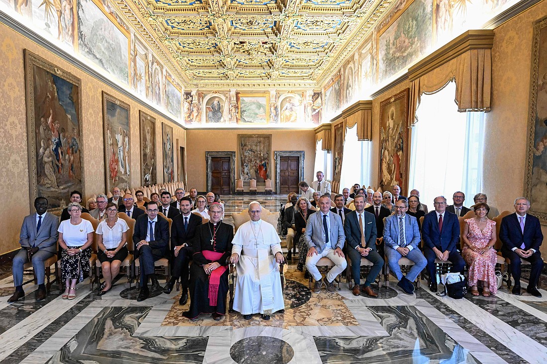 Pope Leo XIV poses for a photo with Catholic politicians and civic leaders from the Diocese of Créteil, France, at the Vatican Aug. 28, 2025. (CNS photo/Vatican Media)