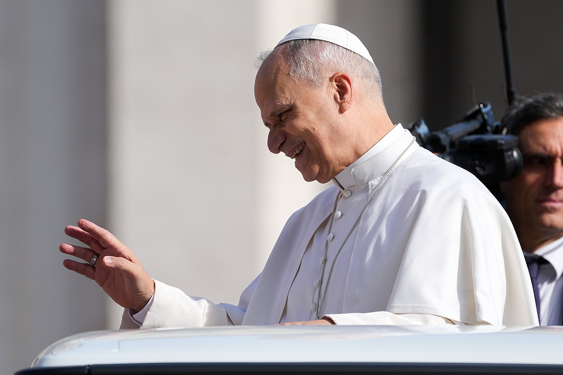 Pope Leo XIV greets visitors and pilgrims from the popemobile as he rides around St. Peter's Square at the Vatican before his weekly general audience Sept. 3, 2025. (CNS photo/Lola Gomez)