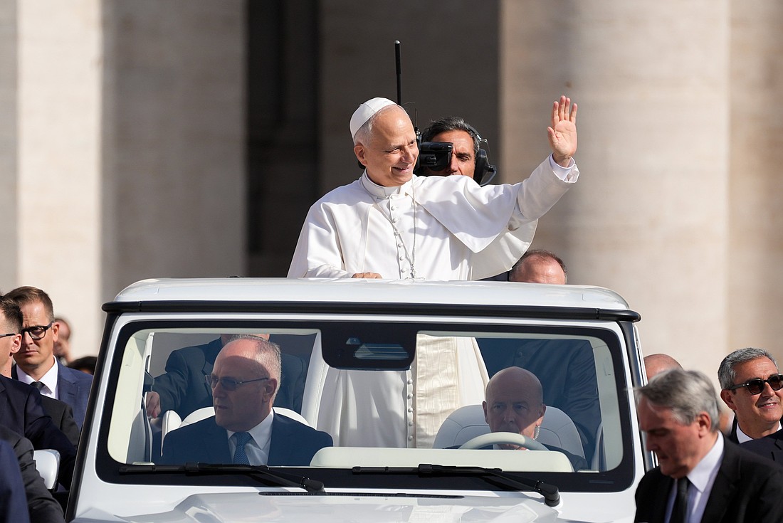 Pope Leo XIV greets visitors and pilgrims from the popemobile as he rides around St. Peter's Square at the Vatican before his weekly general audience Sept. 3, 2025. (CNS photo/Lola Gomez)