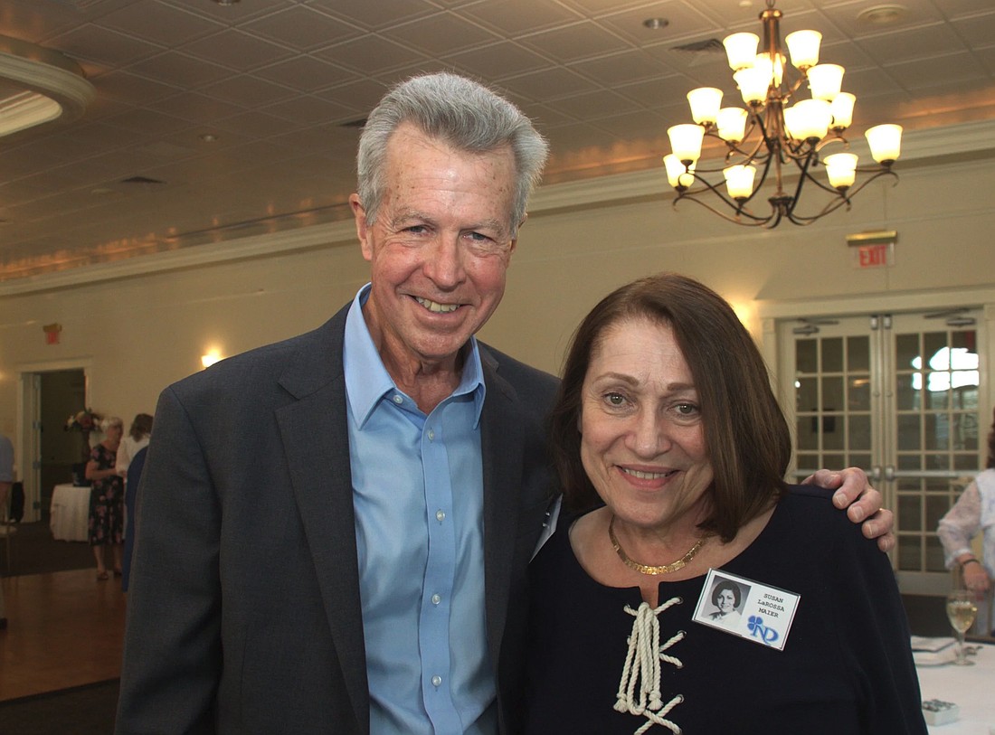 Bob Picozzi, long-time announcer for ESPN, reunites with classmate Susan LaRossa Maier at a recent Class of 1968 reunion. Picozzi will visit his alma mater Sep. 5 to speak to the school's two journalism classes and do the public address announcing for that night's varsity football game. Photo courtesy Notre Dame reunion committee