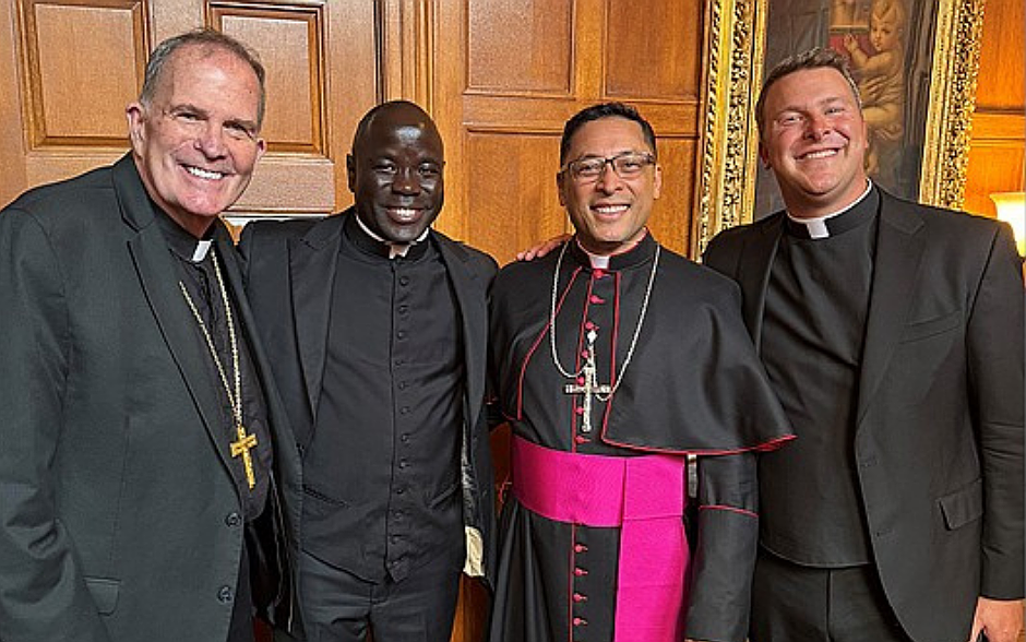 Newly ordained Bishop Chau is pictured with Bishop O'Connell, Father Felicien and Father Dayton.