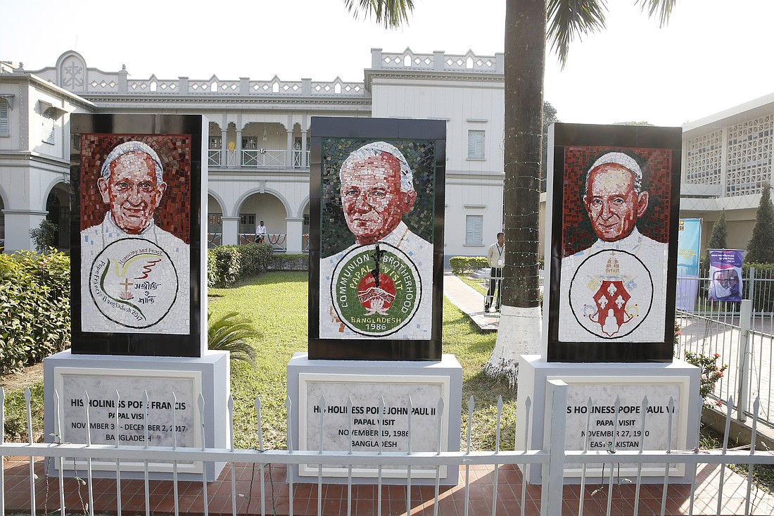 Mosaics of Pope Francis, St. John Paul II, and St. Paul VI are pictured on the grounds of the cathedral in Dhaka, Bangladesh, in this file photo from Dec. 1, 2017. (CNS photo/Paul Haring)