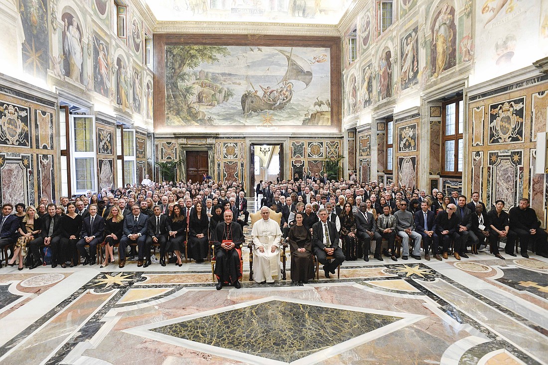 Pope Leo XIV poses for a photo with participants in a conference on human fraternity in the Clementine Hall at the Vatican Sept. 12, 2025. Seated with the pope, from left, are Cardinal Mauro Gambetti, archpriest of St. Peter’s Basilica; Franciscan Sister of the Eucharist Raffaella Petrini, president of the office governing Vatican City State; and Paolo Ruffini, prefect of the Dicastery for Communication. (CNS photo/Vatican Media)